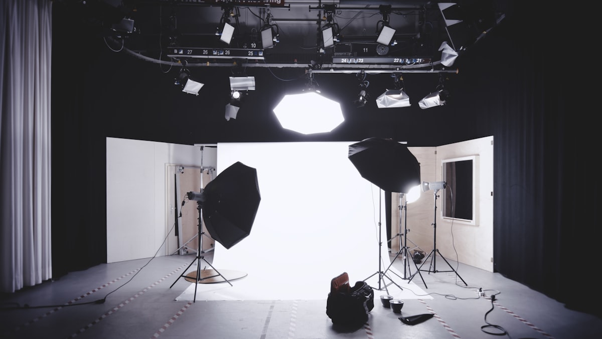 Photography studio with backdrop, softboxes and lighting equipment
